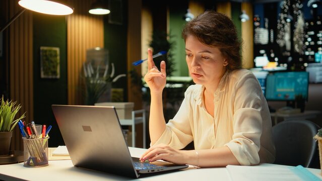 Employee in the office thinks about a tactical solution to increase business activity through intuitive perspective and contemplation while the businesswoman solves a dilemma with a rational outlook.