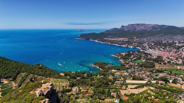 Aerial drone view of bay with turquoise sea and the town of Cassis, Provence, Alps, Cote dAzur, Marseille district, France. High quality 4k footage
