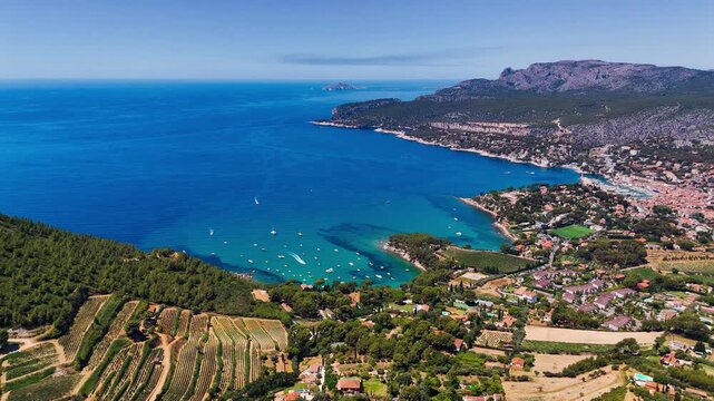 Aerial drone view of bay with turquoise sea and the town of Cassis, Provence, Alps, Cote dAzur, Marseille district, France. High quality 4k footage