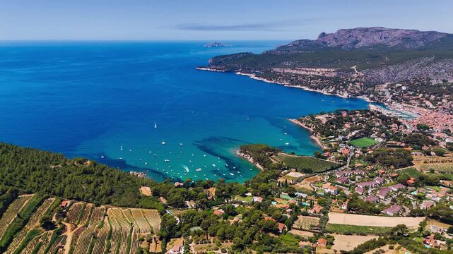 Aerial drone view of bay with turquoise sea and the town of Cassis, Provence, Alps, Cote dAzur, Marseille district, France. High quality 4k footage