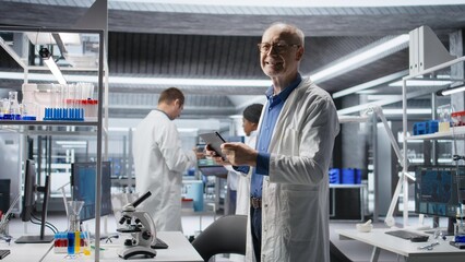 Scientist works with biotechnology and molecular biology tools in a laboratory supporting clinical...