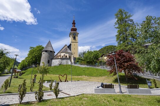 Church of Parrocchia dei SS. Pietro e Paolo Apostoli and medieval tower with old city wall, Tarvisio, Canal Valley, Friuli-Venezia Giulia, Italy