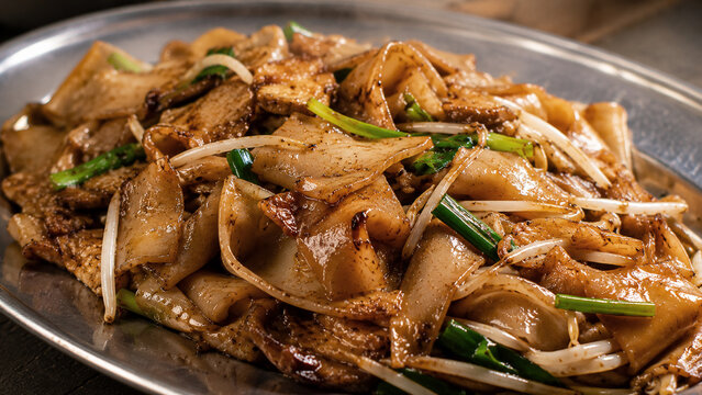 Ho Fun Rice Noodles Close Up, Hong Kong Dry Tossed Wok Fried Noodles, Cantonese Street Food Macro Shot