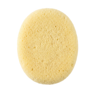 Soft yellow round cosmetic sponge for skincare and makeup application