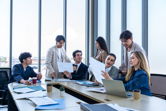 Successful happy workers Group of business people with Multiethnic workers with in company workers Group of asian business people and support Teamwork in the meeting room at modern office.