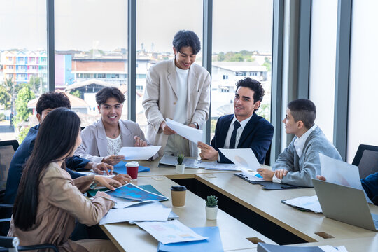 Successful happy workers Group of business people with Multiethnic workers with in company workers Group of asian business people and support Teamwork in the meeting room at modern office.