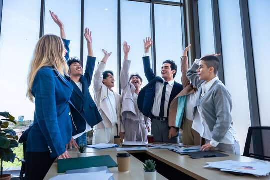 Successful happy workers Group of business people with Multiethnic workers with in company workers Group of asian business people and support Teamwork in the meeting room at modern office.