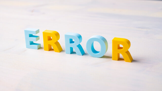 Error and mistake detection concept with contrasting colored letters