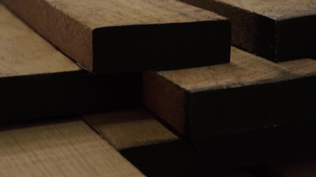 Close-up of industrial automated CNC woodworking machine cutting wood component in modern furniture factory