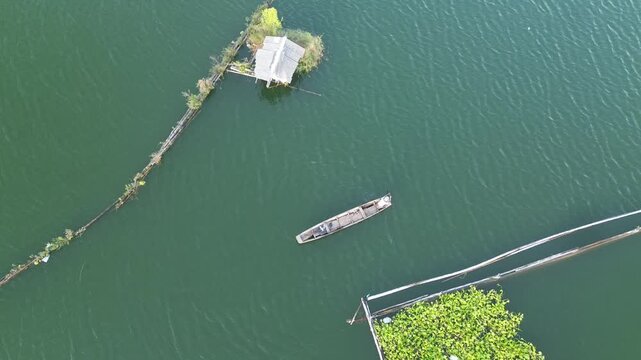 4K Aerial View of Traditional Fishing Boat on Sutami Reservoir in Malang, Indonesia