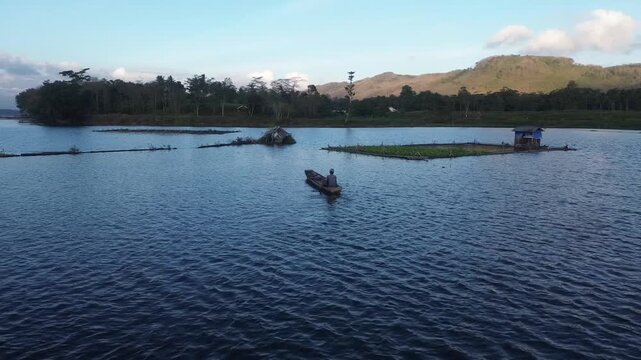 4K Aerial View of Traditional Fishing Boat on Sutami Reservoir in Malang, Indonesia