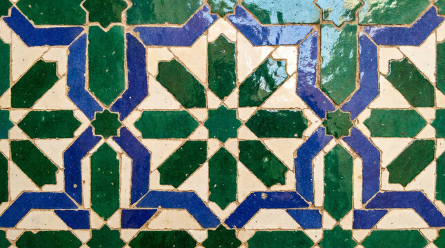 Intricate green and blue geometric Islamic tile design