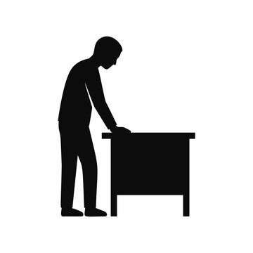 Man leaning over desk silhouette illustration