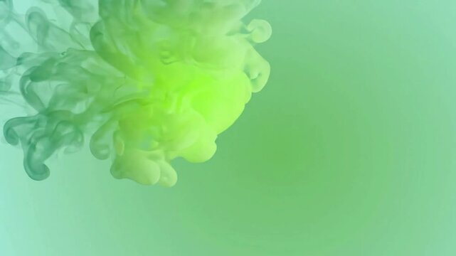 Lime green ink cloud swirling in water, abstract fluid motion background, for creative projects