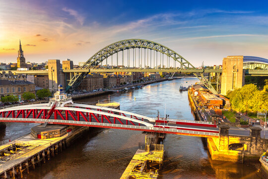Tyne Bridge and Swing Bridge over the River Tyne at sunset in Newcastle upon Tyne, England, UK
