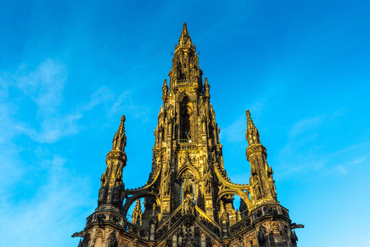 Scott Monument at golden sunset in Edinburgh, Scotland, UK