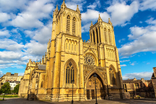 Historic medieval Bristol Cathedral with Gothic towers at sunset in Bristol, England, UK