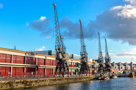 Historic harbour cargo cranes on Bristol Harbour in Bristol, England, UK