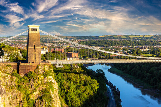 Clifton Suspension Bridge at Dramatic Golden Sunset over the River Avon in Bristol, England, UK
