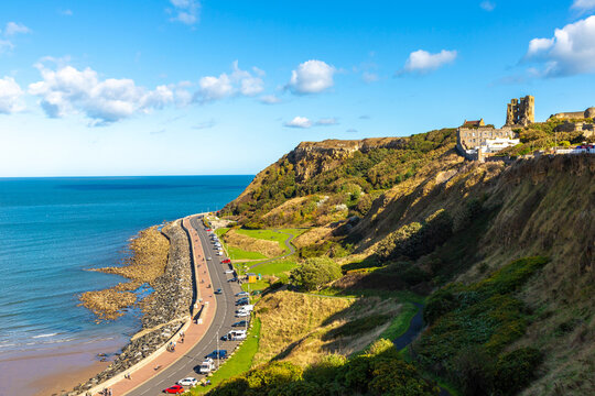 Scarborough Castle above North Bay Coastal Road in Scarborough, North Yorkshire, England, UK