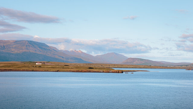 Wide waterfront views of Reykjavik&rsquo;s harbours, piers and shoreline buildings captured in clear August light, Iceland 2026