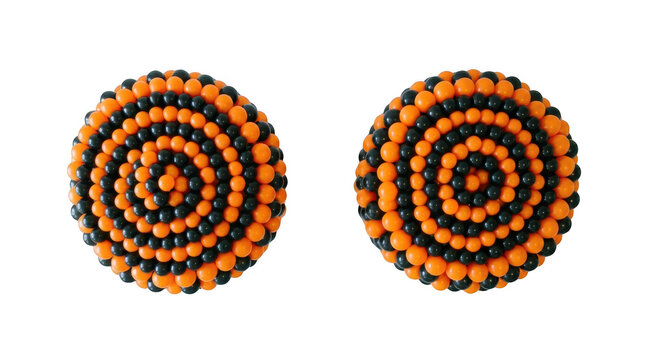 Two circular arrangements of orange and black spheres forming concentric patterns isolated on transparent background