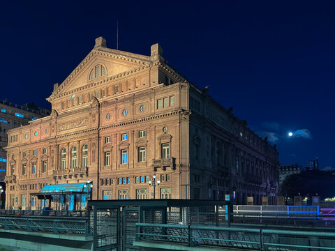 Night view of Teatro Colon opera house and full moon in Buenos Aires