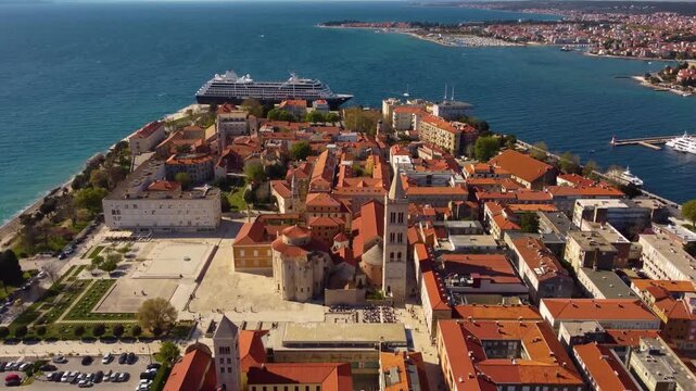 Aerial view of Zadar old town and cruise ship harbor on Adriatic coast.