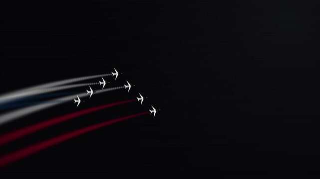 Several military jets soar gracefully across the evening sky leaving colorful smoke trails during an impressive aerial display performed by talented pilots demonstrating their precision