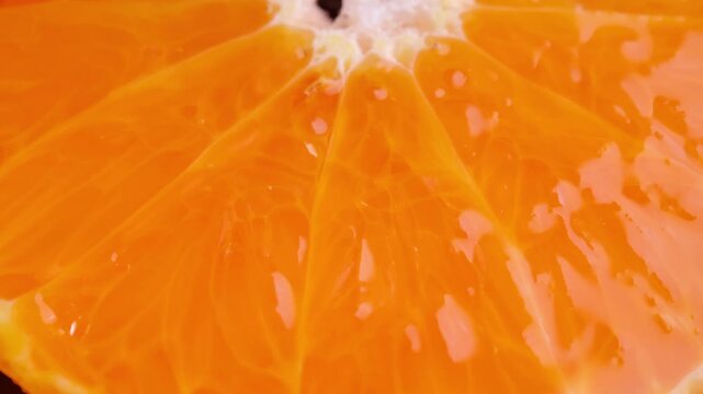 Orange fruit with slices closeup, Top view.