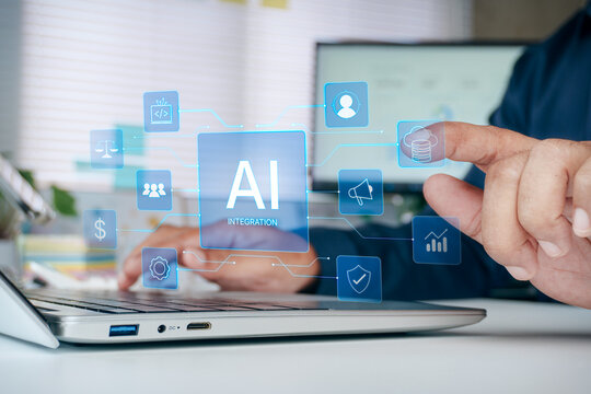 Hand touching digital AI integration hologram screen, technology network icons on laptop computer interface, concept of artificial intelligence, cloud computing, and digital business transformation.