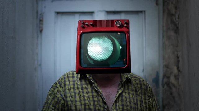 Man with a Vintage Red Television Head Showing a Green Traffic Light - 4K