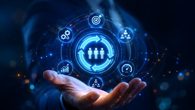 Businessman hand holding human resources management hologram with glowing digital icons for team workflow corporate strategy and business organization