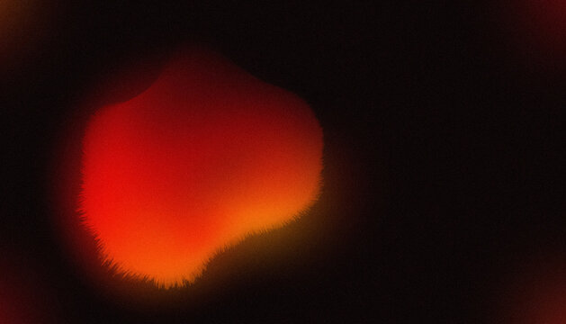 Abstract dark composition featuring a soft molten-like form glowing in warm amber, orange, and subtle red tones. 