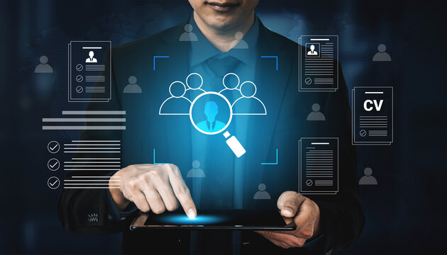 A business professional engages with a tablet displaying recruitment data, highlighting the modern approach to CV analysis in a digital workspace filled with user interface elements. Cyphers