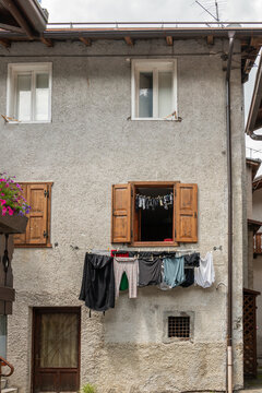 Alleghe, Italy. Household laundry air drying outside a traditional alpine house in the Dolomites