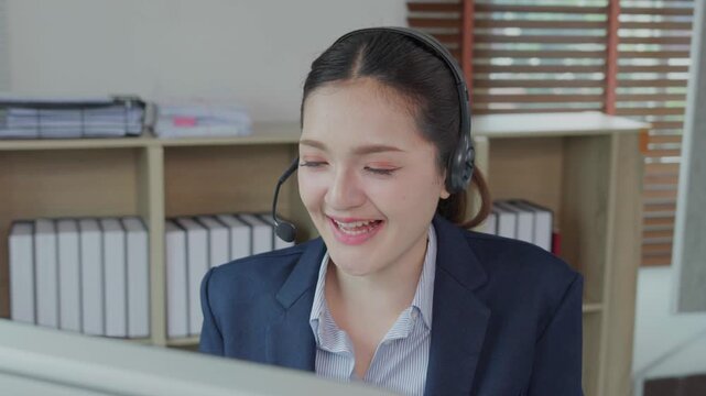 Asian female call center agent providing customer service