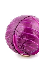 Obraz premium Close-up of purple cabbage with fresh leaves. Vibrant red-purple vegetable with crisp texture and natural sheen. Organic produce for healthy cookin...