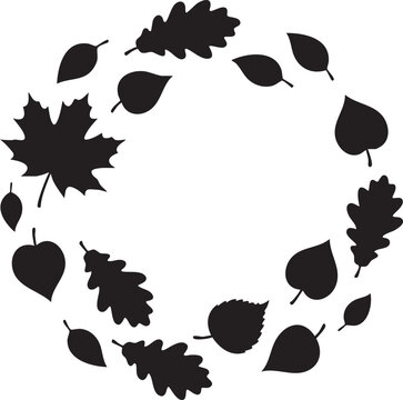 Black silhouette of autumn leaves arranged in a circular wreath shape