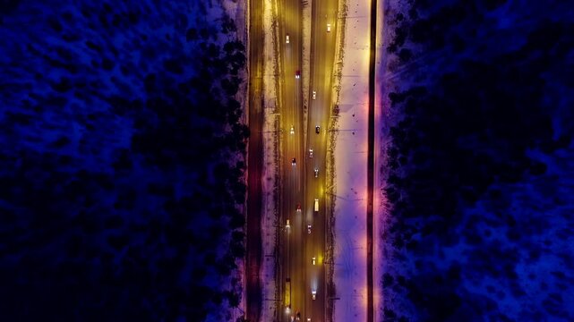 Ekaterinburg, Russia. Crossroads in the form rings. Interchange at night. Active traffic. Drone footage, HEAD OVER SHOT