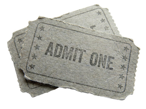 Two vintage paper admit one tickets stacked on a white background for event entry and cinema admission
