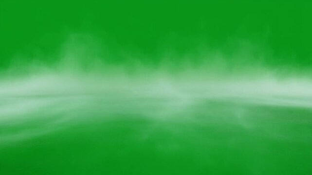 Freezing White Vapor Flowing Across Ground on Green Screen