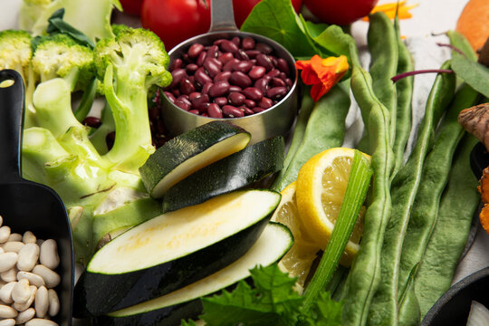 Fresh vegetables, fruits, beans and nuts. Food cooking background.