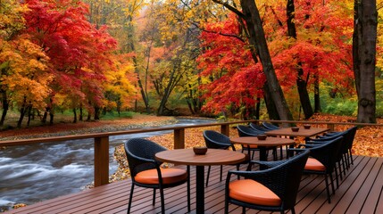 Fototapeta premium Outdoor dining terrace by river during autumn foliage