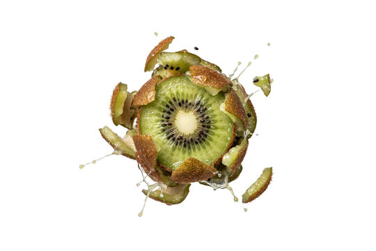 Fresh green kiwi fruit exploding with juice droplets and flying skin fragments on a white background, isolated on a, transparent background