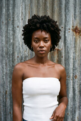 Fototapeta premium Woman with natural afro hairstyle in studio portrait session