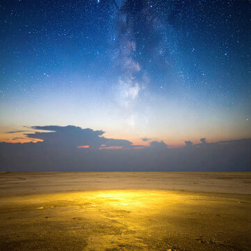 Milky Way night sky above reflective desert salt flat at twilight with golden light, dramatic cloud horizon, vast landscape and tranquil natural atmosphere