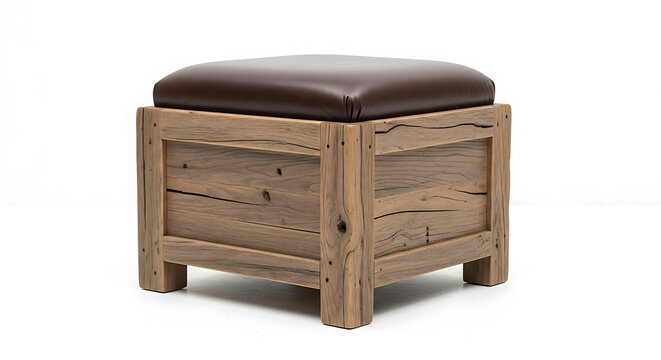 A rustic wooden ottoman with a brown leather seat cushion against a plain white background with square footstool weathered