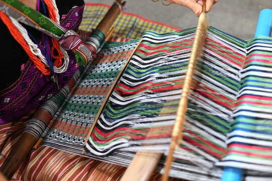Traditional Hill Tribe Hand Weaving Loom with Colorful Striped Fabric, Thailand