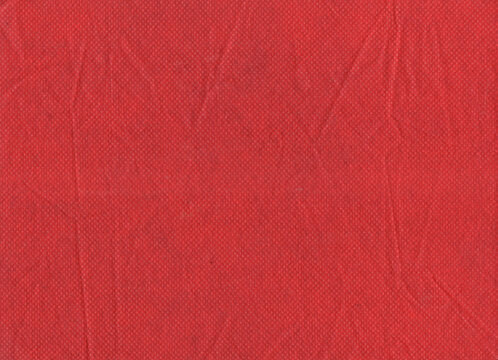 red fabric texture, red non-woven fabric texture - abstract wrinkled polypropylene canvas background